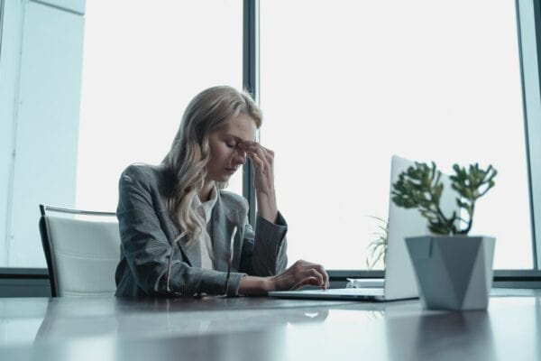 woman stressed working in an office